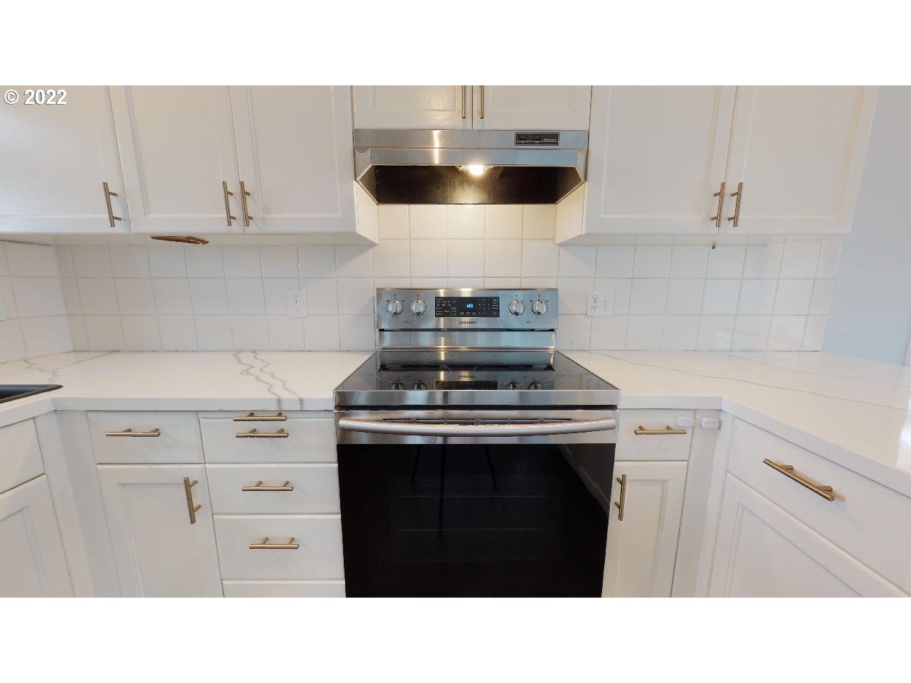 335 Mill Beach Road Brookings, OR 97415 - Photo 8 of 32 a kitchen with a stove and a sink