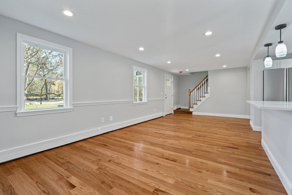 184 Booth Hill Road Scituate, MA 02066 - Photo 24 of 32 a view of empty room with wooden floor and fan