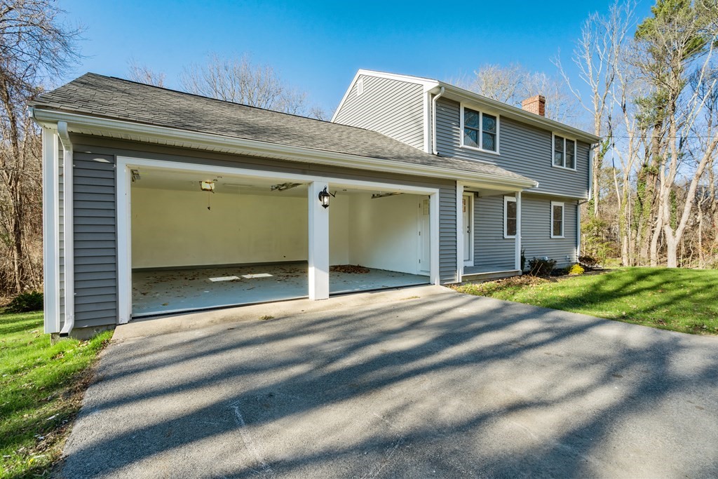 184 Booth Hill Road Scituate, MA 02066 - Photo 31 of 32 a view of a house with a yard
