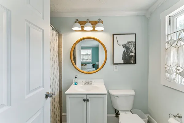 a view of a storage and utility room with washer and dryer