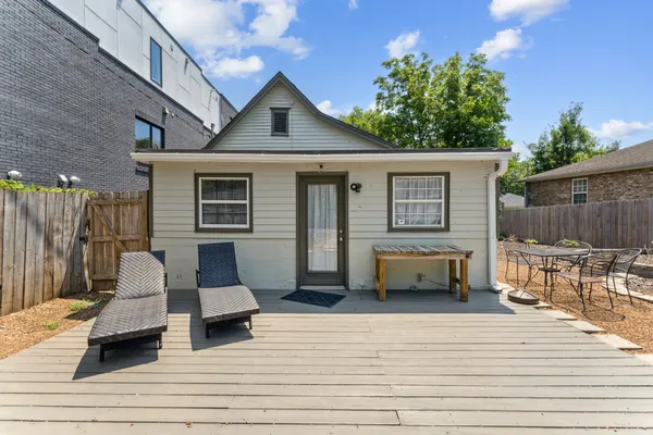 a front view of a house with a patio