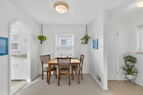 a kitchen with a sink stove and refrigerator