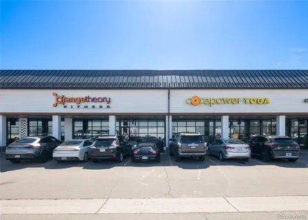 a view of a car park in front of house