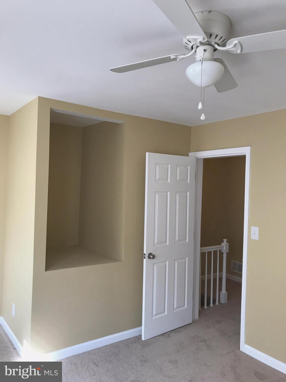 505 Welbrook Road Baltimore, MD 21221 - Photo 14 of 27 a view of a livingroom with a chandelier fan