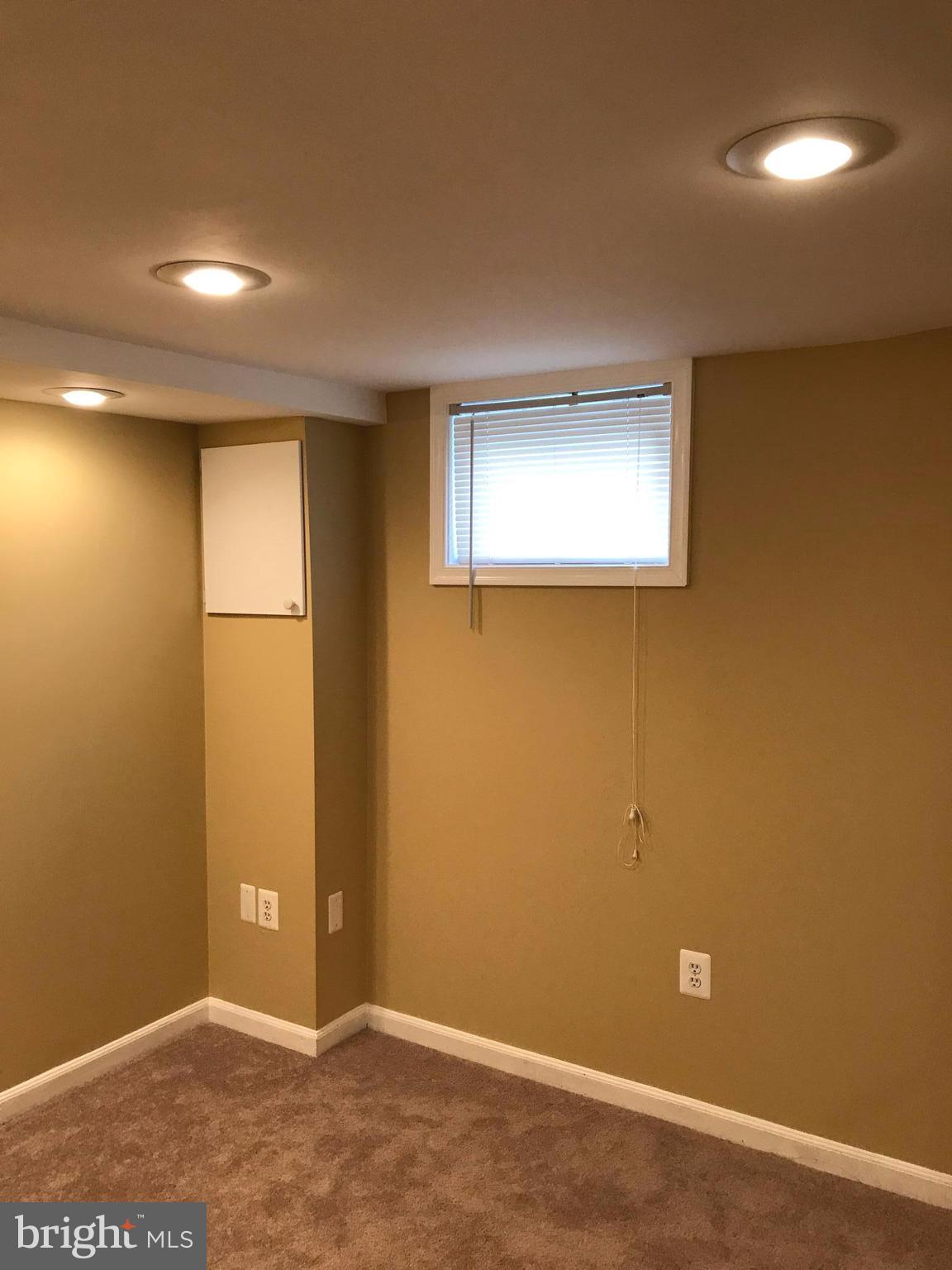 505 Welbrook Road Baltimore, MD 21221 - Photo 16 of 27 a view of an empty room with a window