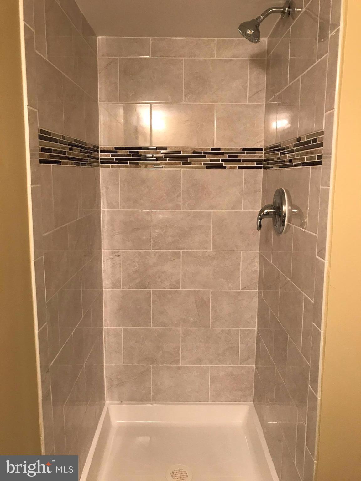 505 Welbrook Road Baltimore, MD 21221 - Photo 20 of 27 a bathroom with a shower