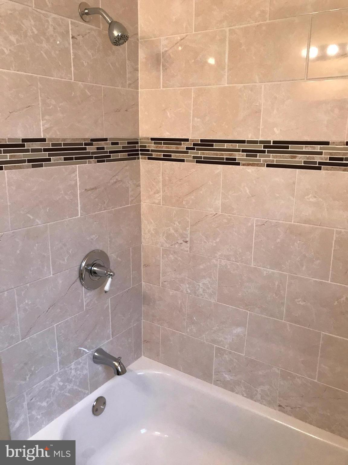 505 Welbrook Road Baltimore, MD 21221 - Photo 10 of 27 a bathroom with a shower