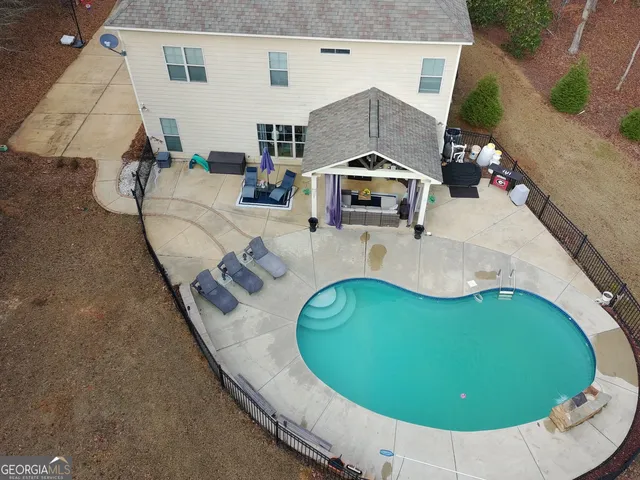 a picture of a bathroom with a sink and mirror