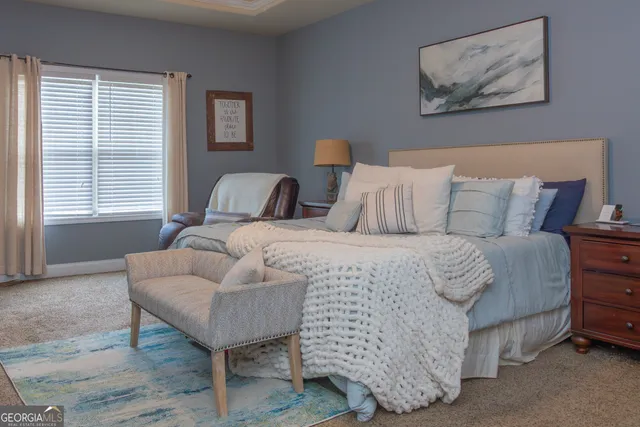 a bathroom with a tub and a shower