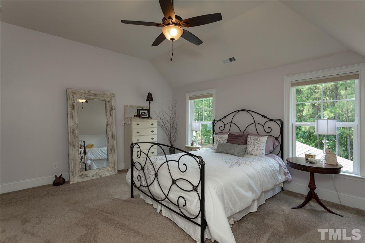1224 Harrison Ridge Road Wake Forest, NC 27587 - Photo 15 of 25 Large secondary bedroom upstairs can be used as a master with en suite bath.