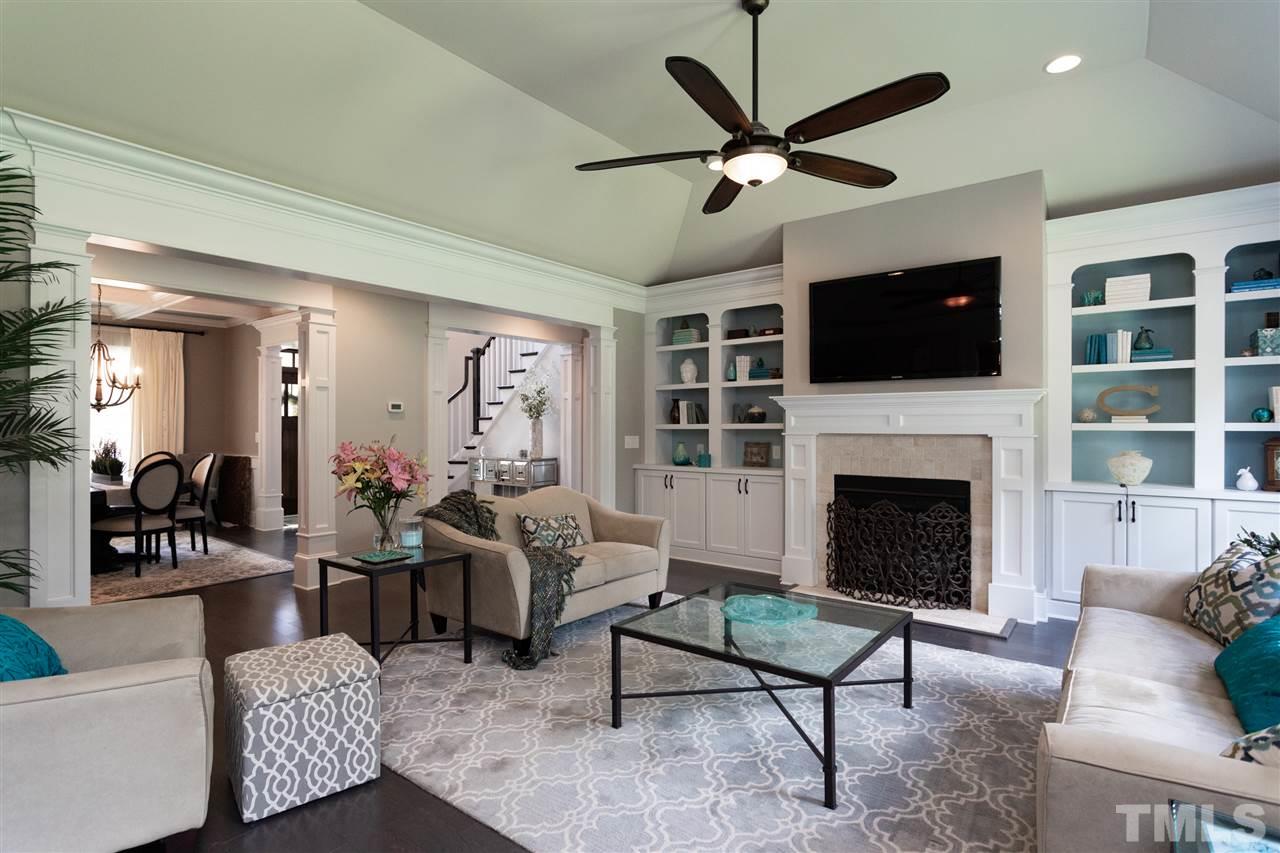 1224 Harrison Ridge Road Wake Forest, NC 27587 - Photo 7 of 25 With custom built-ins and crown throughout.
