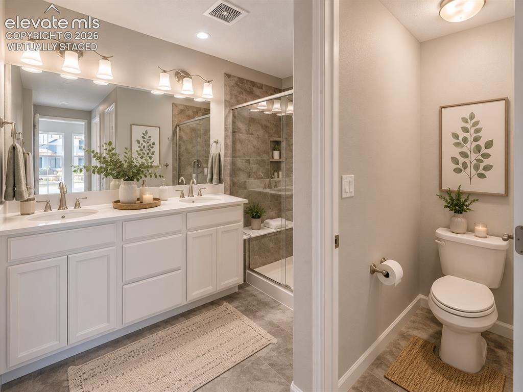 1306 Promontory Bluff View Colorado Springs, CO 80921 - Photo 21 of 39 virtually staged upstairs master