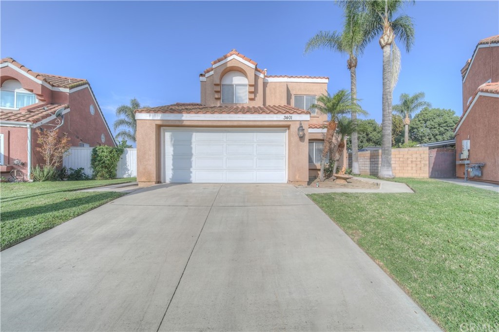 3401 Cedarglen Road Ontario, CA 91761 - Photo 1 of 1 a front view of a house with garden