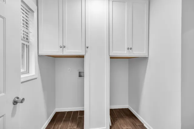 a view of walk in closet with rug