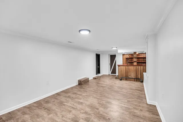 a view of a hallway with a large window