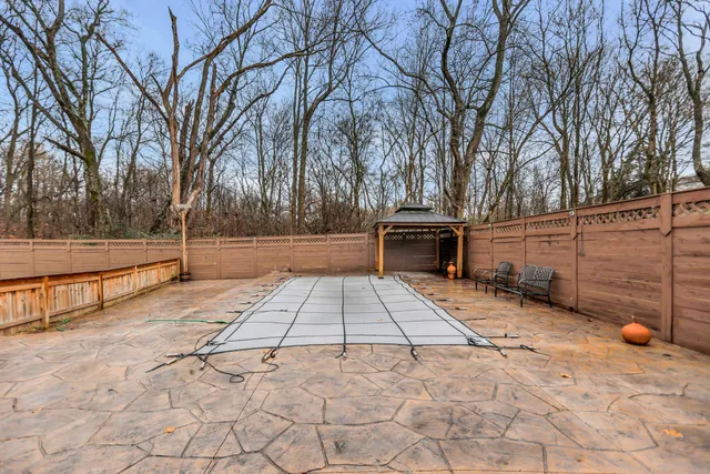 a view of a balcony with furniture