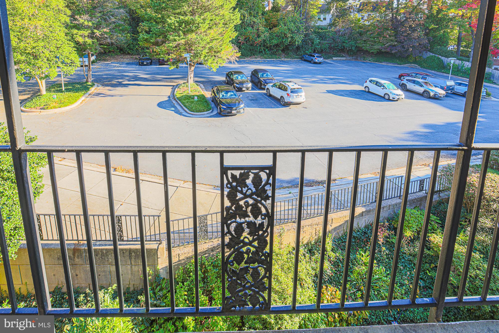 3535 Chevy Chase Lake Drive, Unit 310 Chevy Chase, MD 20815 - Photo 13 of 40 a front view of a house with garden