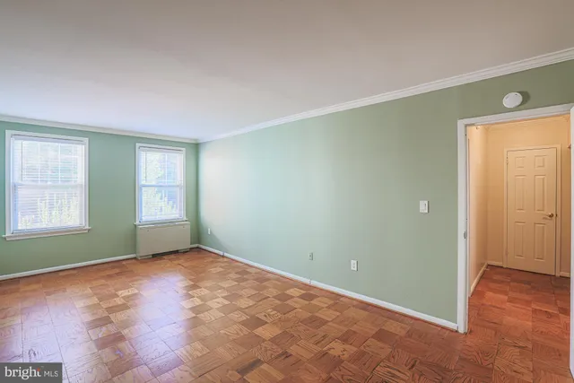 an empty room with windows