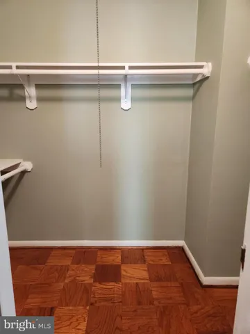 a view of a room with racks on the wall