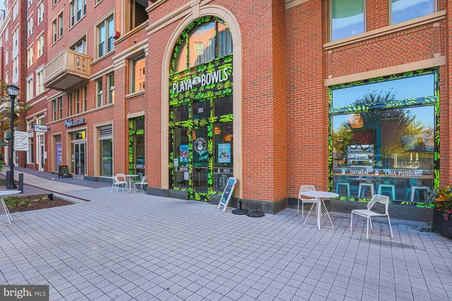 a car parked in front of brick building
