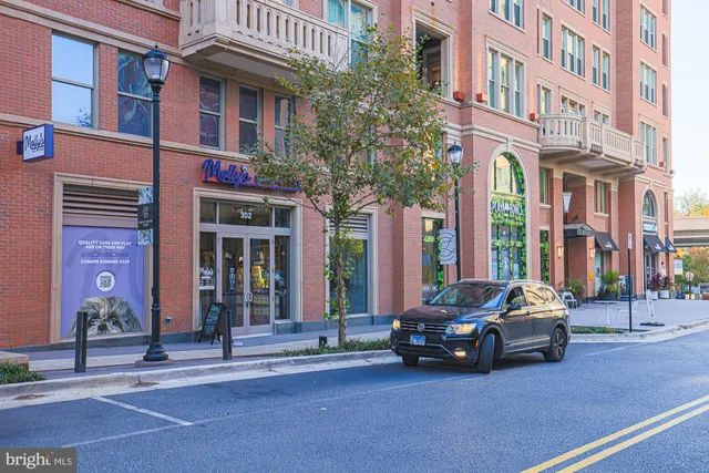 a view of a patio with chairs and tables