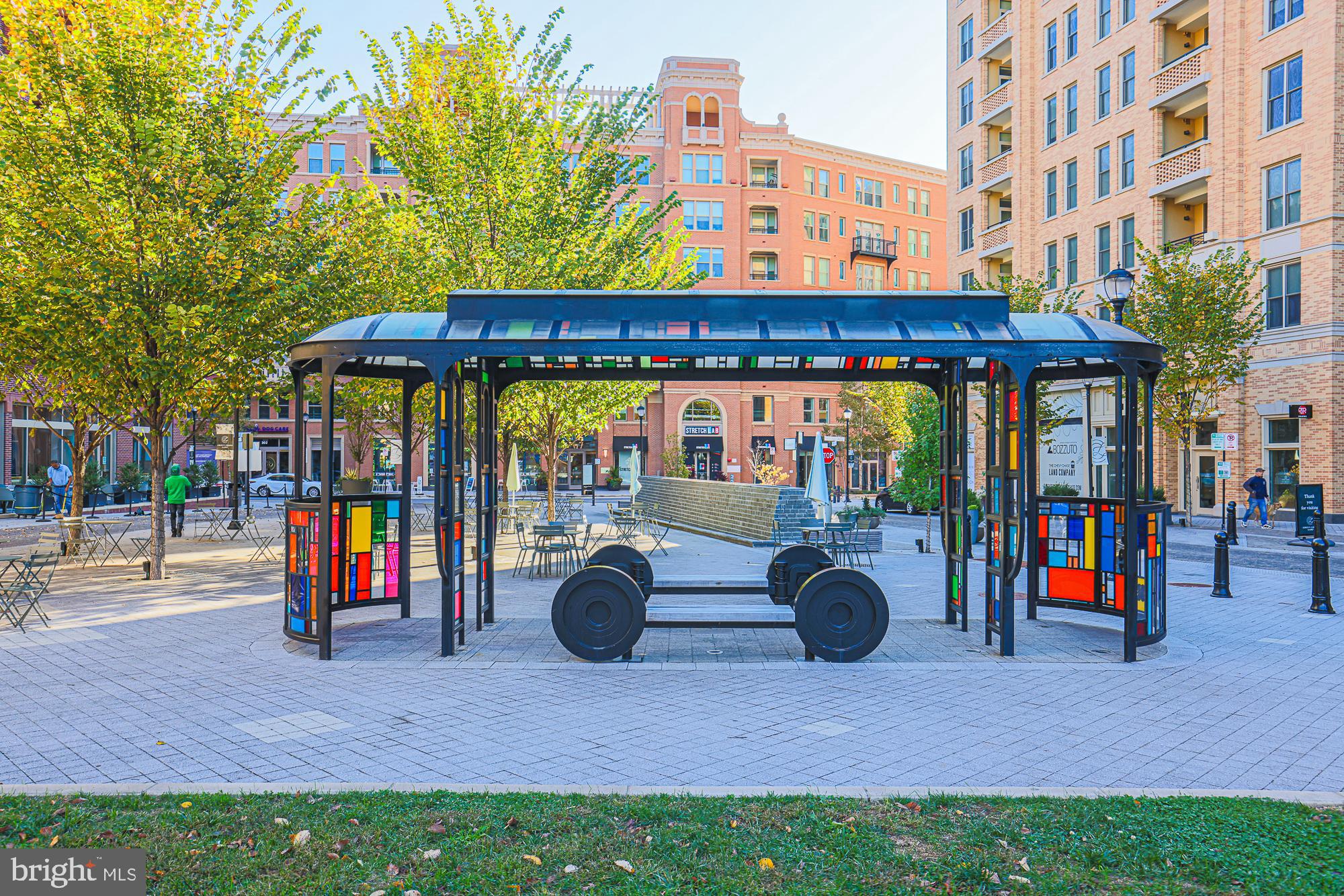 3535 Chevy Chase Lake Drive, Unit 310 Chevy Chase, MD 20815 - Photo 32 of 40 an outdoor space with seating