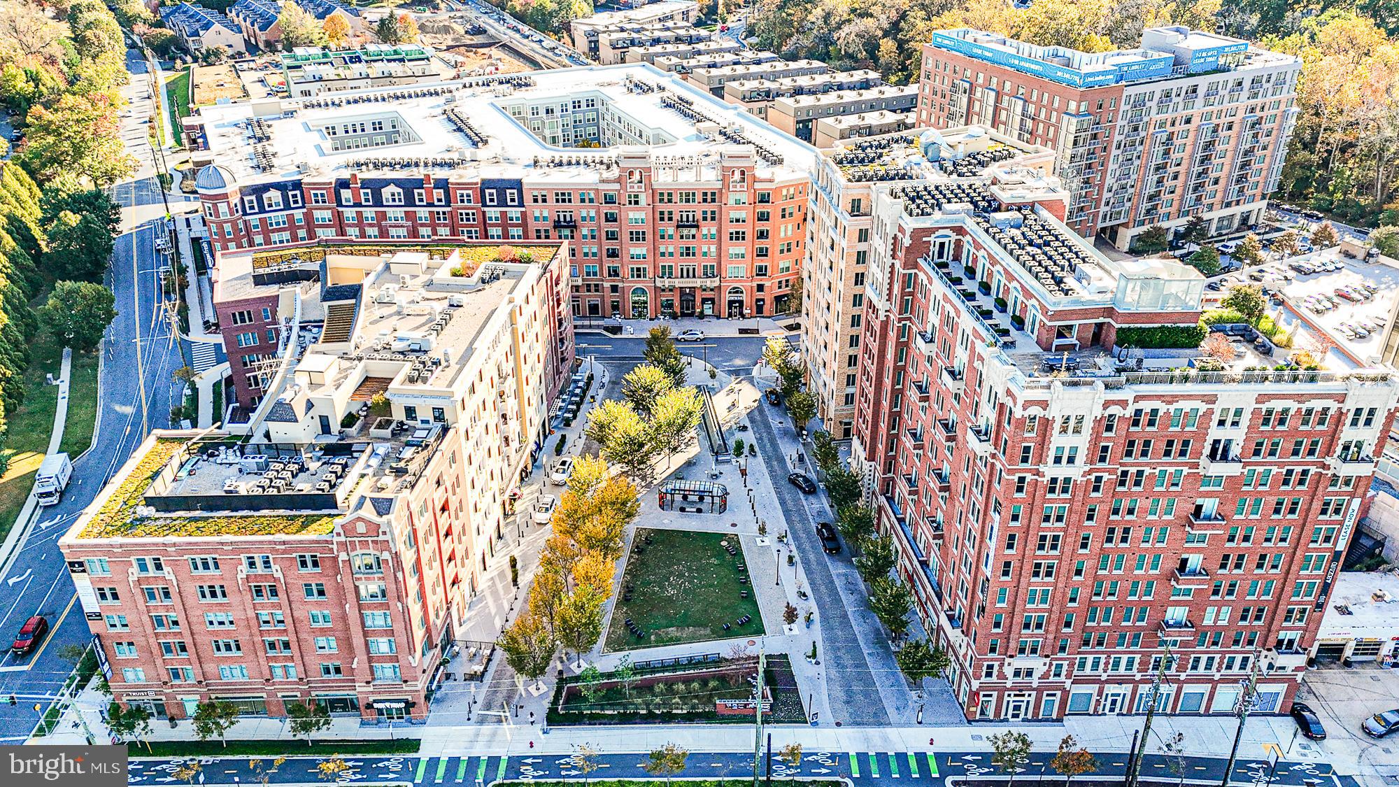 3535 Chevy Chase Lake Drive, Unit 310 Chevy Chase, MD 20815 - Photo 34 of 40 a picture of building with a outdoor space
