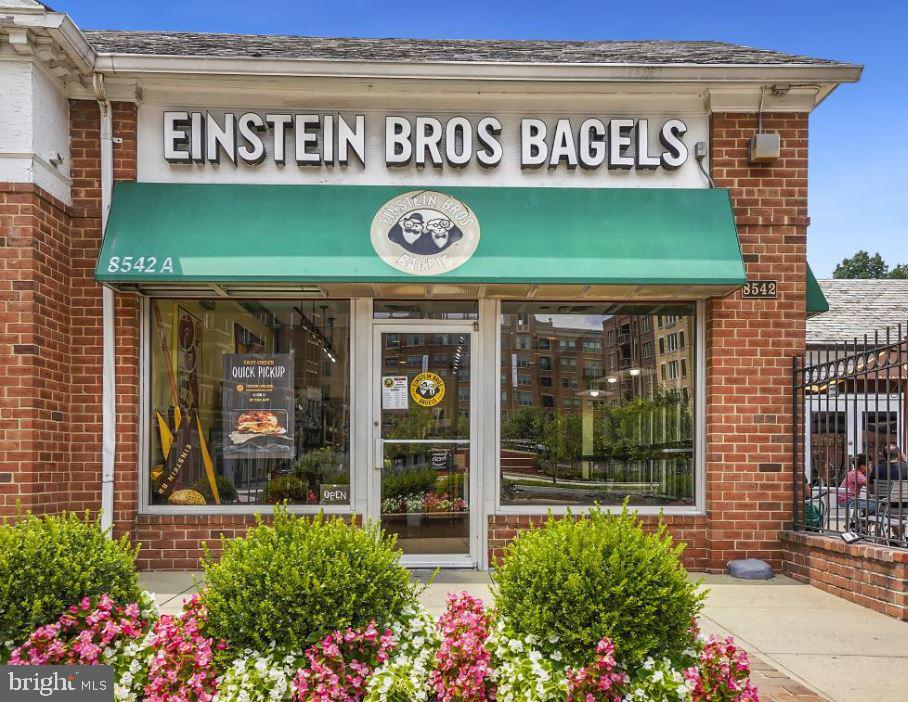 3535 Chevy Chase Lake Drive, Unit 310 Chevy Chase, MD 20815 - Photo 40 of 40 a view of a book shop with a lot of flowers