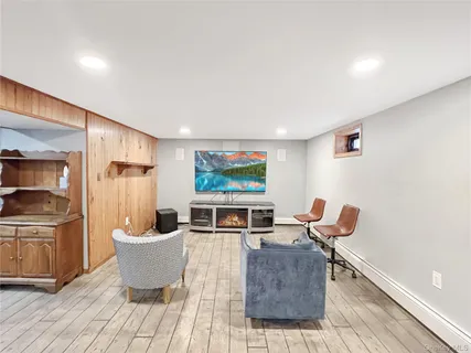 a view of a kitchen with a sink cabinets and a window