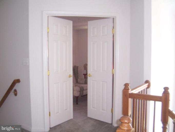 6905 Golden Raintree Court Clinton, MD 20735 - Photo 13 of 25 Double Door Entry to Master Bedroom