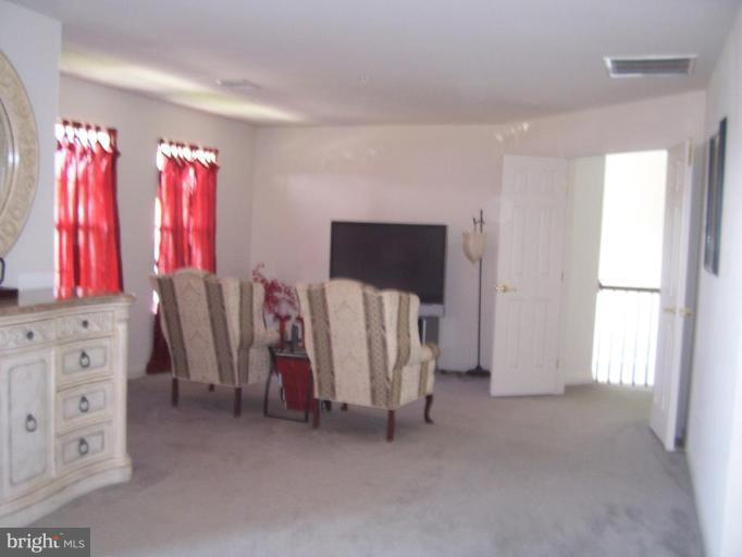 6905 Golden Raintree Court Clinton, MD 20735 - Photo 15 of 25 Master Bedroom Sitting Area