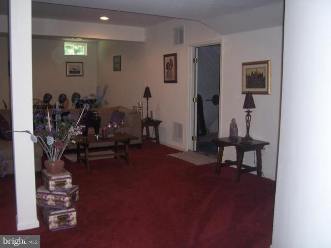 6905 Golden Raintree Court Clinton, MD 20735 - Photo 20 of 25 Lower Level Recreation Room