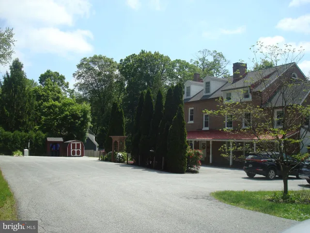 a view of house with a outdoor space