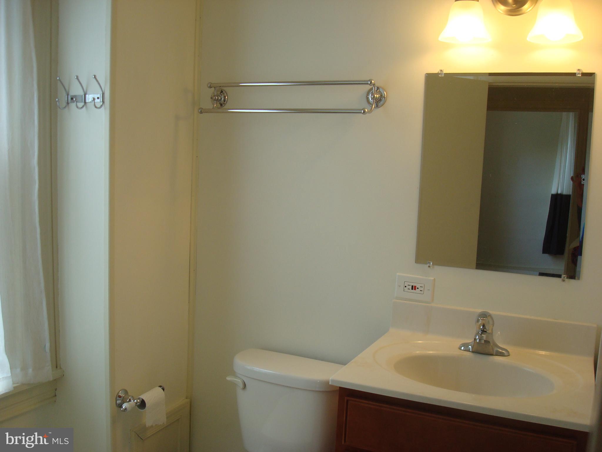 514 Spring Grove Lane, Unit 3 West Chester, PA 19382 - Photo 15 of 35 a bathroom with a sink and a toilet