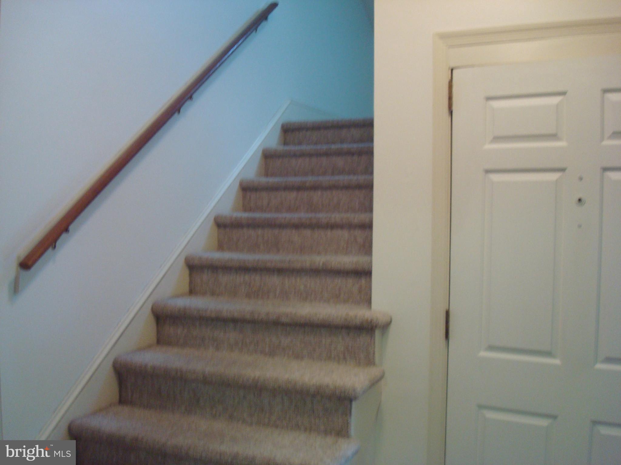 514 Spring Grove Lane, Unit 3 West Chester, PA 19382 - Photo 18 of 35 a view of staircase with white walls