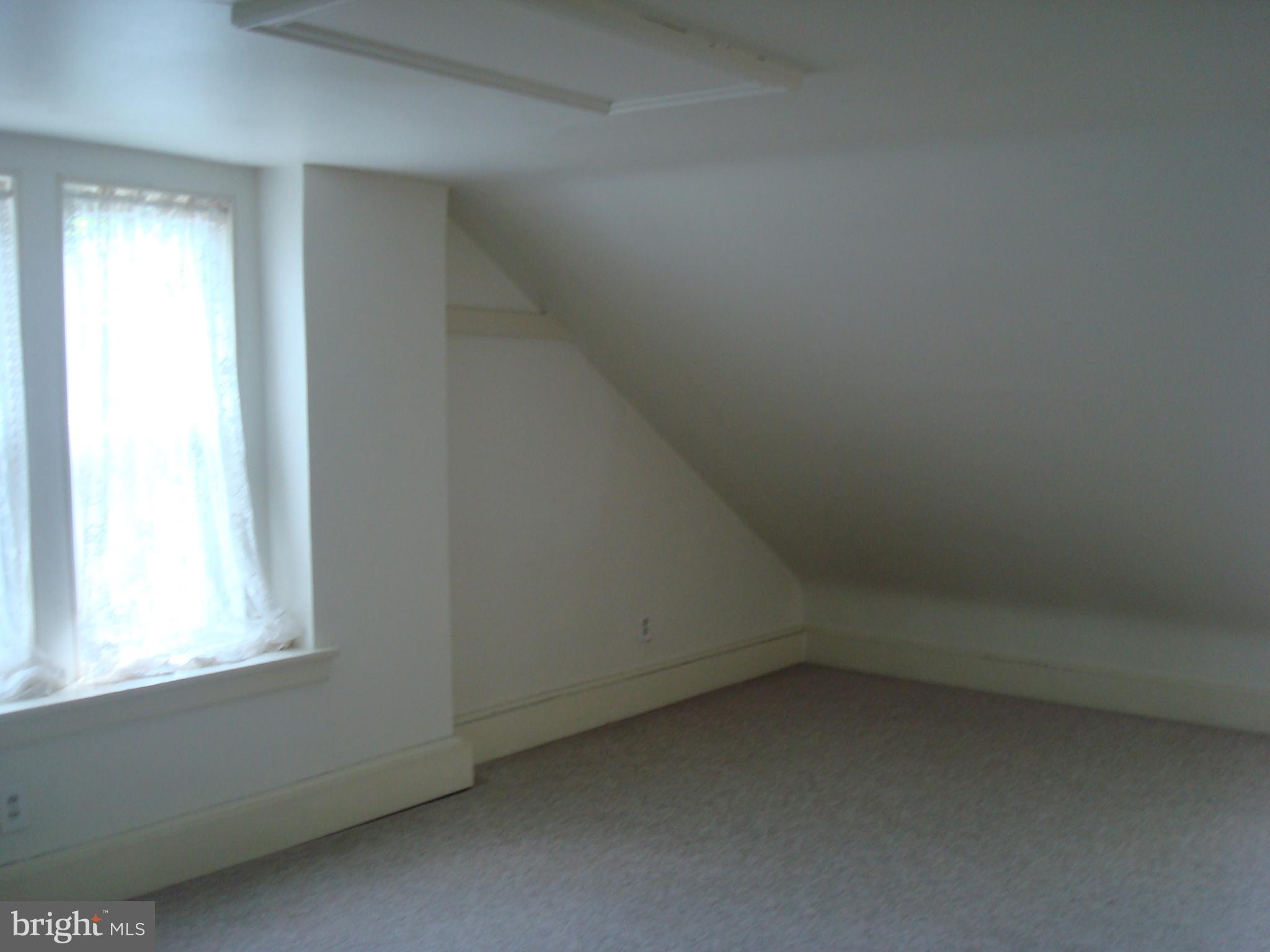 514 Spring Grove Lane, Unit 3 West Chester, PA 19382 - Photo 20 of 35 an empty room with a window
