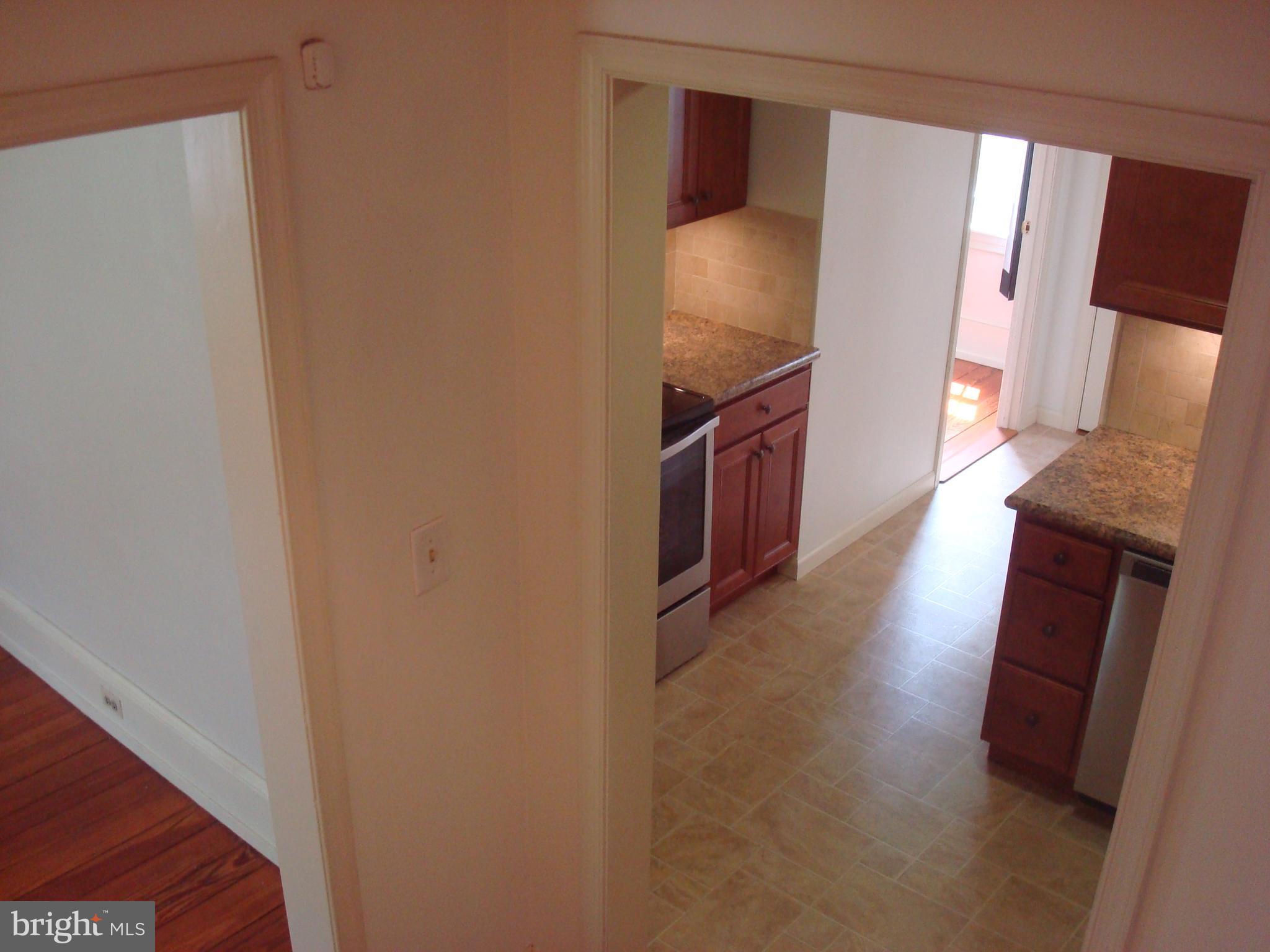 514 Spring Grove Lane, Unit 3 West Chester, PA 19382 - Photo 25 of 35 a view of a kitchen from the hallway