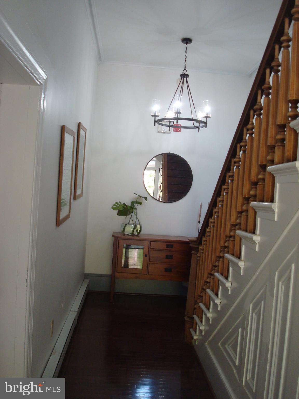 514 Spring Grove Lane, Unit 3 West Chester, PA 19382 - Photo 4 of 35 a view of entryway and hall with wooden floor