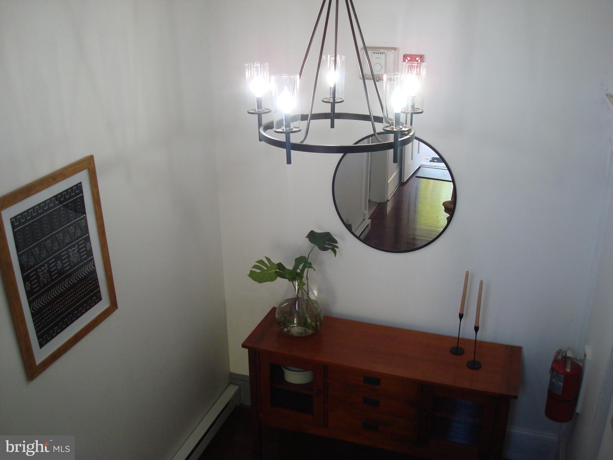 514 Spring Grove Lane, Unit 3 West Chester, PA 19382 - Photo 6 of 35 a dining room with a table and chairs