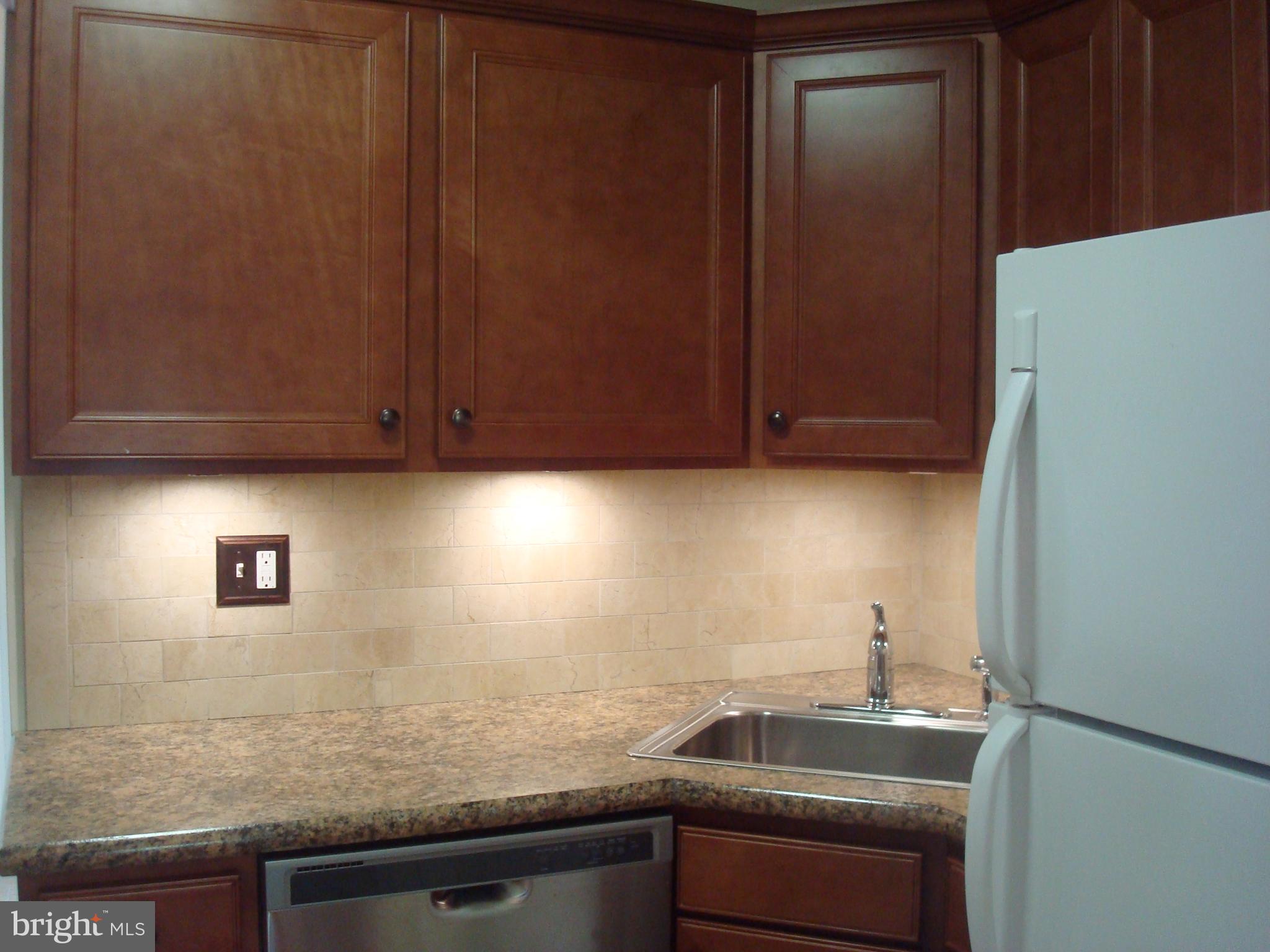 514 Spring Grove Lane, Unit 3 West Chester, PA 19382 - Photo 9 of 35 a kitchen with a sink cabinets and appliances