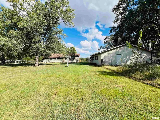 a view of an outdoor space and swimming pool
