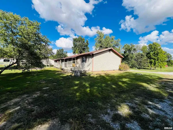 a view of a house with a big yard