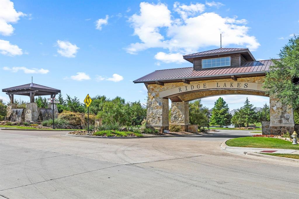 a view of a building with a yard