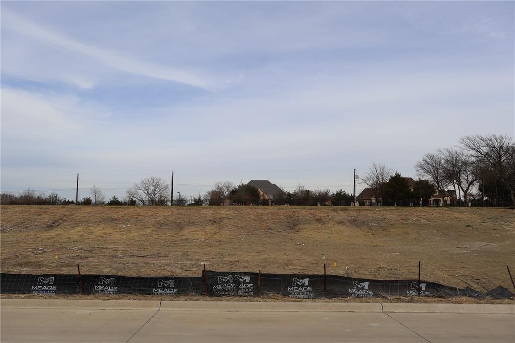 119 Timber Cv Place Heath, TX 75032 - Photo 9 of 15 a view of lake and mountain