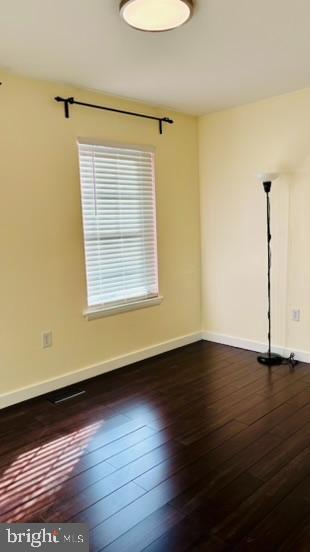 14308 Lindendale Road Woodbridge, VA 22193 - Photo 12 of 39 a view of an empty room with wooden floor and a window