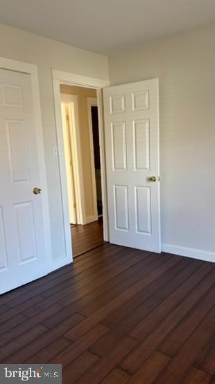 14308 Lindendale Road Woodbridge, VA 22193 - Photo 14 of 39 a view of an empty room with wooden floor and window