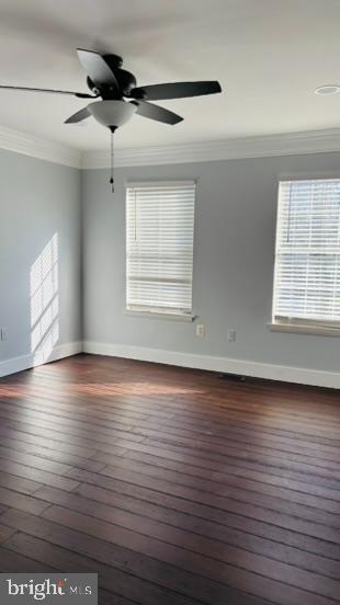 14308 Lindendale Road Woodbridge, VA 22193 - Photo 3 of 39 an empty room with wooden floor and windows