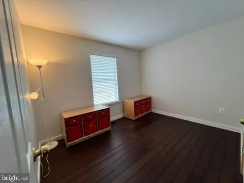 a close view of a stove top oven and cabinets