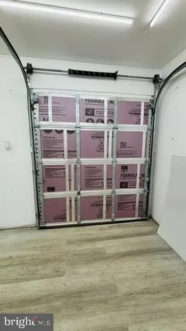 a picture of a wall with a painting on the wall