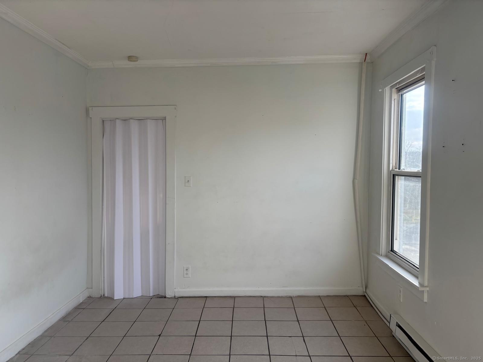 1308 East Main Street Waterbury, CT 06705 - Photo 6 of 10 a view of an empty room